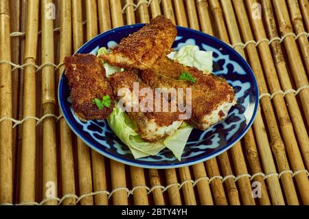 Filets de poisson Tex-Mex, filets de poisson blanc cuits dans un bain de salsa maison. Banque D'Images