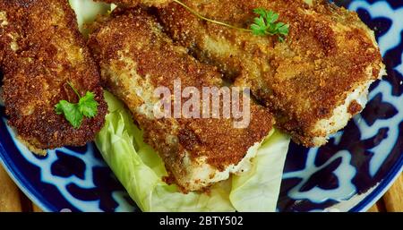 Filets de poisson Tex-Mex, filets de poisson blanc cuits dans un bain de salsa maison. Banque D'Images