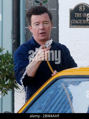 Rick Astley filmant du vidéo de musique pour sa chanson qu'elle me fait, octobre 2018 Banque D'Images