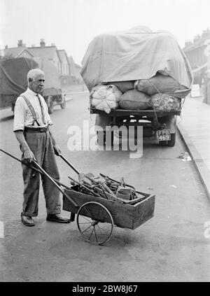 Marchands de fer et de déchets . 1937 . Banque D'Images