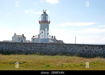 Phare sur une falaise de Howth, Irlande Banque D'Images