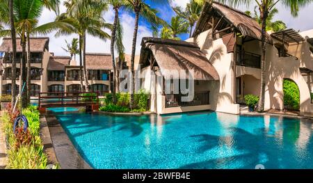 complexe hôtelier 5 étoiles de luxe avec piscine et chambres et villas - Constance Belle Mare Plage. Île Maurice. Pointe de flacq , Belle M Banque D'Images