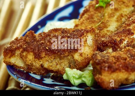 Filets de poisson Tex-Mex, filets de poisson blanc cuits dans un bain de salsa maison. Banque D'Images