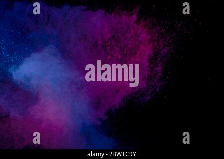 Explosion de poussière colorée abstraite sur fond noir.abstraite poudre splatted fond, mouvement de gel de la poudre de couleur explosion/projection de poudre de couleur Banque D'Images