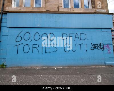 Glasgow, Écosse, Royaume-Uni. 3 juin 2020 : un graffiti anti-conservateur sur un mur d'angle. Cette prise a été prise pendant le coronavirus (COVID-19). Banque D'Images