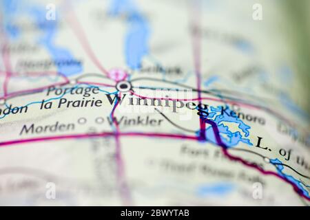 Faible profondeur de champ mise en évidence sur la carte géographique emplacement de Winnipeg ville Canada Amérique continent sur atlas Banque D'Images