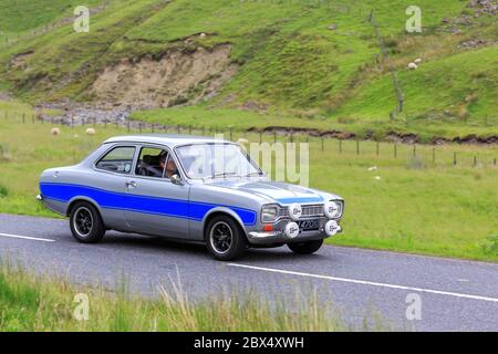 MOFFAT, ÉCOSSE - 29 JUIN 2019: 1971 Ford Escort MK1 voiture RS dans un rallye de voiture classique en route vers la ville de Moffat, Dumfries et Galloway Banque D'Images