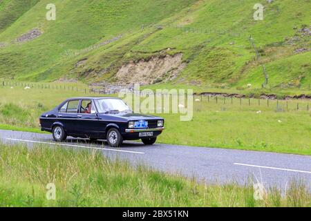 MOFFAT, ÉCOSSE - 29 JUIN 2019: 1979 Ford Escort MK2 1.3 Ghia voiture dans un rallye automobile classique en route vers la ville de Moffat, Dumfries et Galloway Banque D'Images