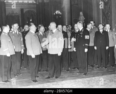 Après la session du Reichstag à l'Opéra de Berlin Kroll le 20 février 1938, les députés arrivent à la salle blanche du Palais de la ville. 1ère rangée, 3ème de gauche Robert Ley, en face de lui Wilhelm Frick, à droite Walther Funk. Banque D'Images