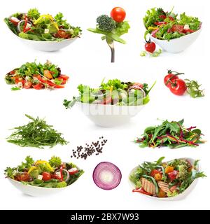 Collection de salades, isolé sur blanc. Inclut une salade verte, salade verte, salade grecque, salade de poulet, et d'ingrédients. Banque D'Images