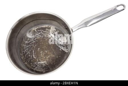 Casserole de sauce en ruines d'un pot de dépôt de minéraux brûlé d'eau bouillie sèche Banque D'Images