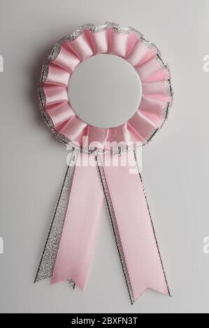 Badge rose Clean sur fond blanc Banque D'Images