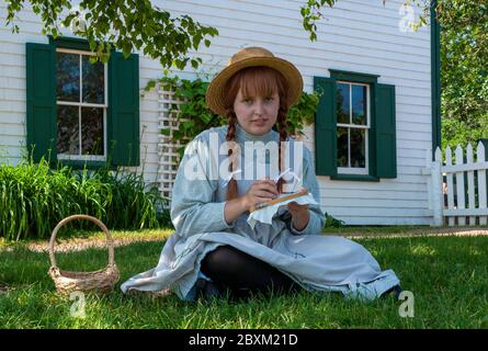 Anne de Green Gables. Actrice dans le personnage fictif d'Anne Shirley - l'héroïne du roman bien-aimé de Lucy Maud Montgomery. Cavendish, Î.-P.-É., Canada Banque D'Images