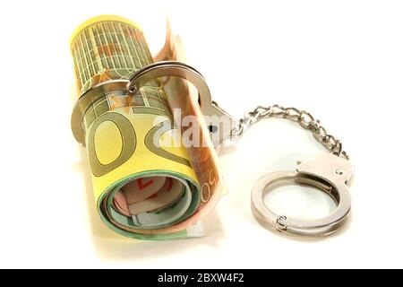 Euro notes avec menottes Banque D'Images