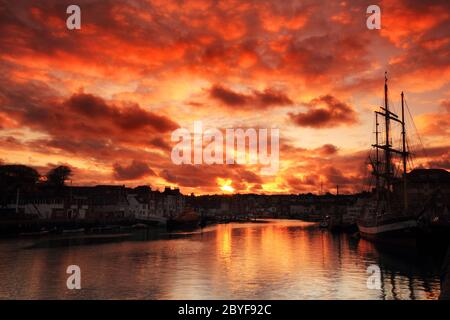 Port de Weymouth au coucher du soleil Banque D'Images