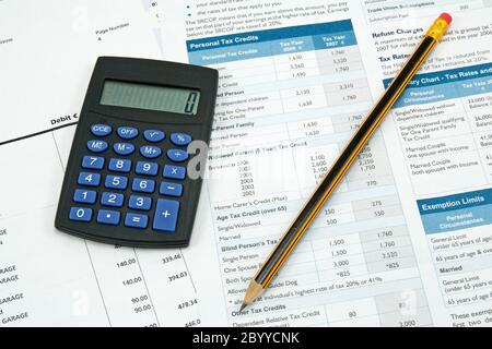 calculatrice, crayon et formulaire de taxe Banque D'Images