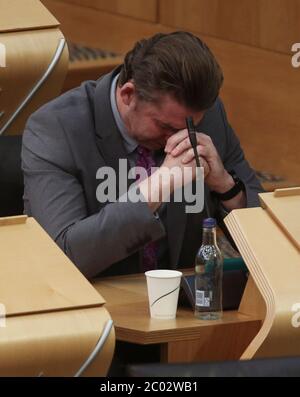 Brian Whittle MSP pendant le débat sur le gouvernement écossais : faire preuve de solidarité avec l'anti-racisme, dans la salle de débat du Parlement écossais à Édimbourg. Banque D'Images