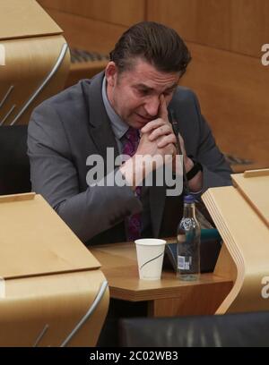 Brian Whittle MSP pendant le débat sur le gouvernement écossais : faire preuve de solidarité avec l'anti-racisme, dans la salle de débat du Parlement écossais à Édimbourg. Banque D'Images