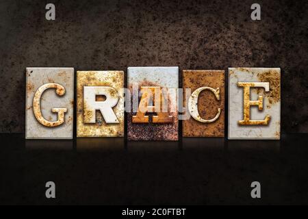 Concept de typographie Grace sur fond sombre Banque D'Images