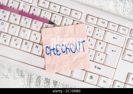 Écriture manuscrite. Photo conceptuelle point où les marchandises sont payées dans un supermarché ou un autre magasin clavier blanc fournitures de bureau Banque D'Images