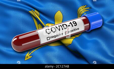 Drapeau du Suffolk agitant dans le vent avec un tube à essai sanguin Covid-19 positif. Banque D'Images