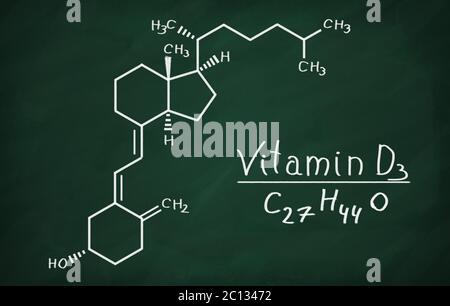 Modèle structural de molécule de vitamine D3 sur le tableau noir. Banque D'Images