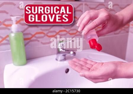 Écriture conceptuelle montrant des gants chirurgicaux. Concept signification protéger contre l'exposition à des matières infectieuses procédures de lavage des mains pour les minim Banque D'Images
