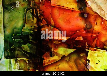 Liquides colorés mélangés dans un fluide créant une peinture abstraite colorée Banque D'Images