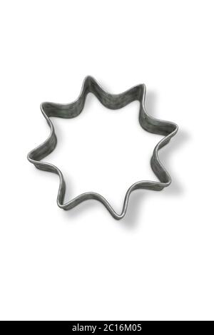 Couteau à pâtisserie en forme d'étoile sur surface blanche Banque D'Images