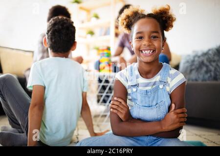 Happy black family having fun times at home Banque D'Images