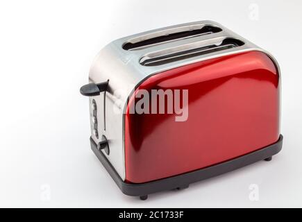 Grille-pain rétro rouge brillant lumineux isolated on white Banque D'Images