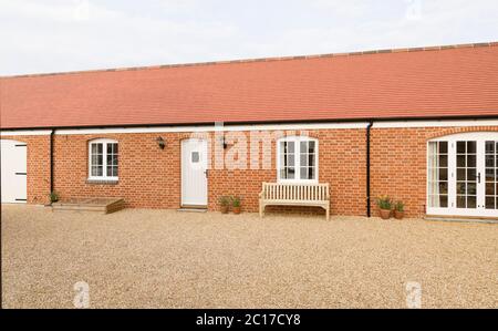 Conversion de grange pour fournir une annexe granny d'un étage, annexe. Extérieur de la maison britannique Banque D'Images