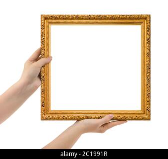 Cadre photo en bois dans les mains Banque D'Images