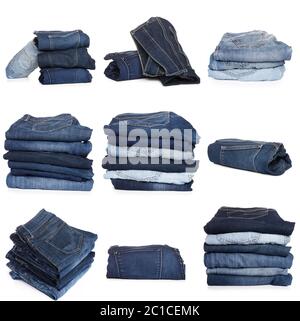 Collection de jeans pliés isolés sur fond blanc Banque D'Images