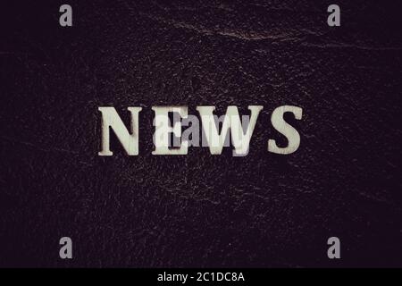 Concept de mot d'actualité. Mot d'actualité sur le tableau noir Banque D'Images