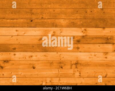 mur ou plancher en bois brun chaud avec des panneaux noués à grain en bois ancien réutilisé Banque D'Images