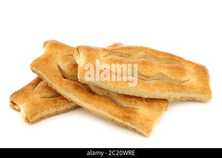 Les biscuits hollandais traditionnels enrobés de sucre appelés « kaking » sur fond blanc Banque D'Images