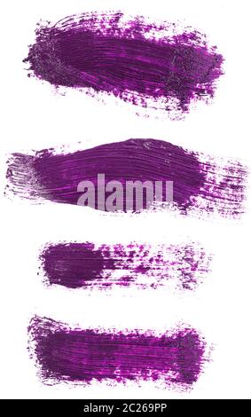 Enduire de peinture violet isolé sur blanc. Set Banque D'Images