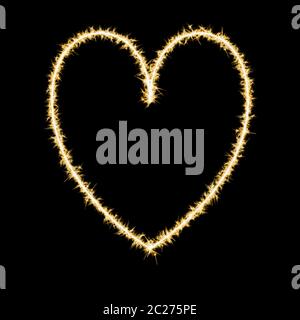 Forme d'un coeur en sparkles sur fond noir