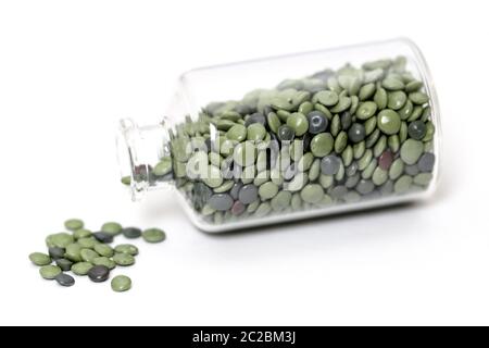 Des granules dans diverses formes et contenants Banque D'Images