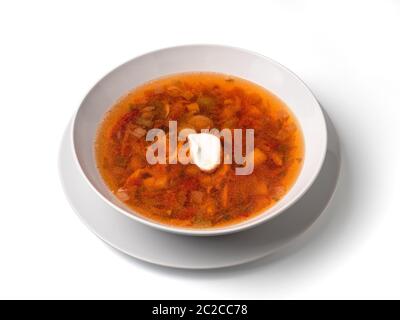 soupe dans une assiette isolée Banque D'Images