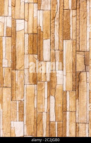 Texture de la pierre de carrelage. Pour l'arrière-plan ou le sol. Fragment d'un mur d'une pierre ébréchée Banque D'Images