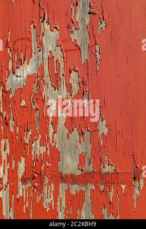 Close up de texture de fond en bois vieilli vintage rouge de style rustique avec murs peinture flakesof Banque D'Images