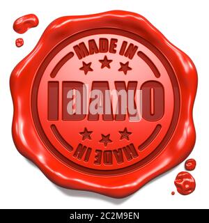 Fabriqué en Idaxo - estampé sur le joint de cire rouge isolé sur le blanc. Concept d'entreprise. Rendu 3D. Banque D'Images