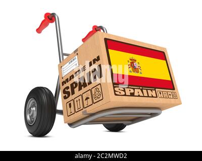 Boîte en carton avec drapeau de l'Espagne et texte Made in Spain sur camion main White Background. Concept de livraison gratuite. Banque D'Images