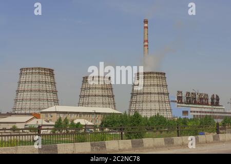 CHP Industrial landscape. View of the power station smoke comes from pipes Stock Photo