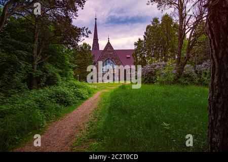 Vieille église Koiviston kirkko finlandais de Primorsk ville de Russie au coucher du soleil. Voyages en Europe. Banque D'Images