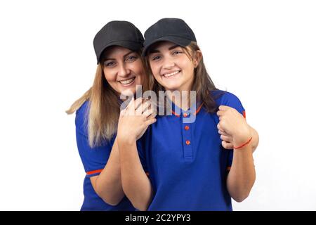 Portrait de deux femmes heureuses, mère et fille en T-shirts bleus Banque D'Images