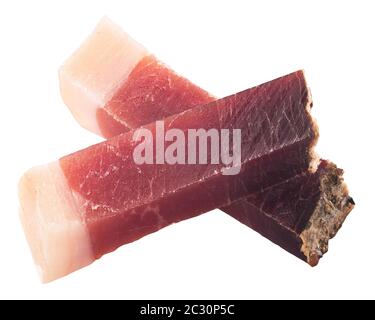 Bâtonnets de Speck, une viande de porc sutyrolienne ou du jambon fumé séché, isolés Banque D'Images