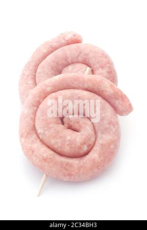 Spiral-Shaped Bratwurst brutes Isolated On White Banque D'Images